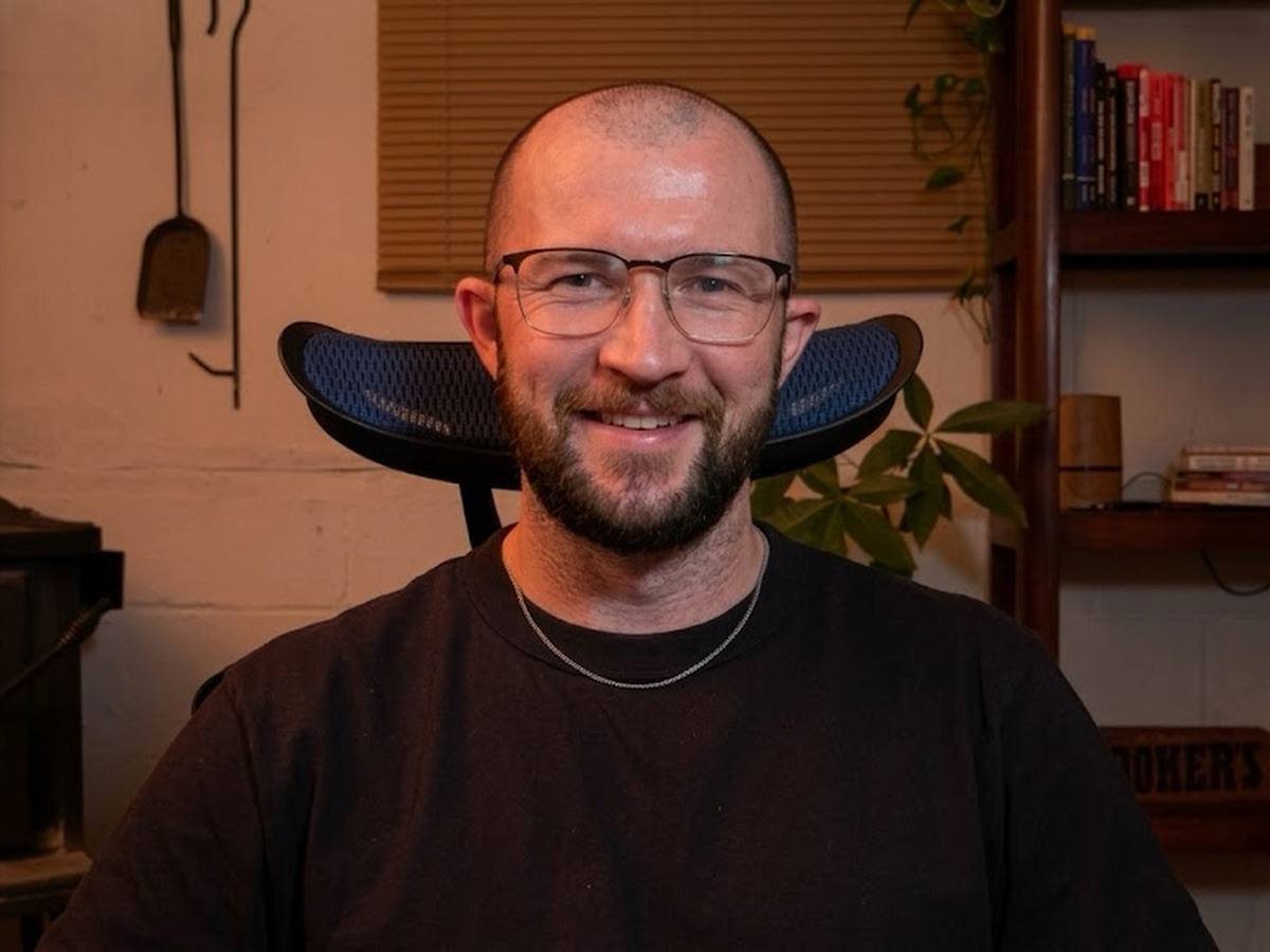 Zachary Hoppaugh at his desk, the one person who builds and runs your marketing